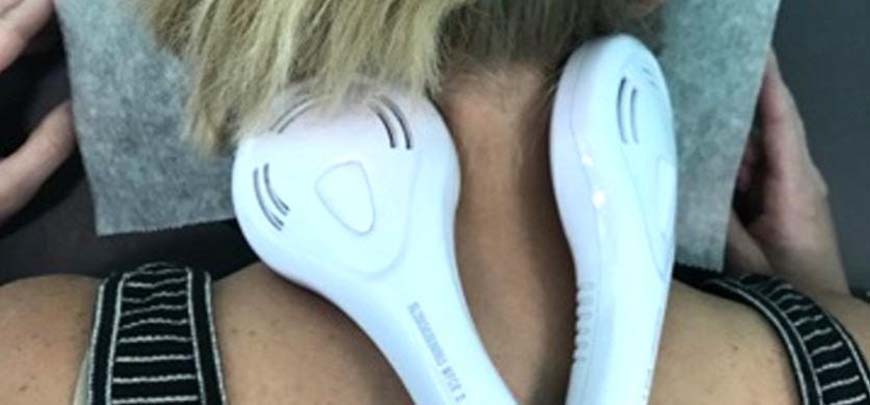 patient receiving Low-level Laser Therapy as part of her neuropathy treatment protocol