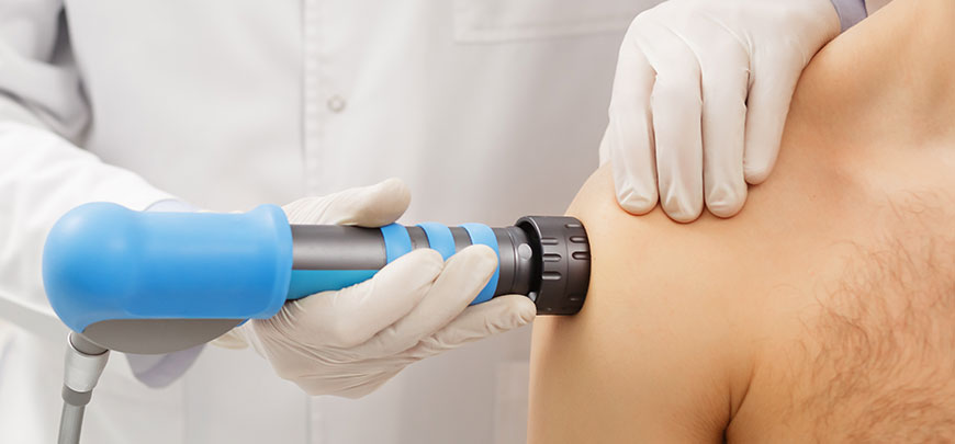 patient receiving shockwave therapy as part of the neuropathy treatment protocol at Hifai Chiropractic in San Diego